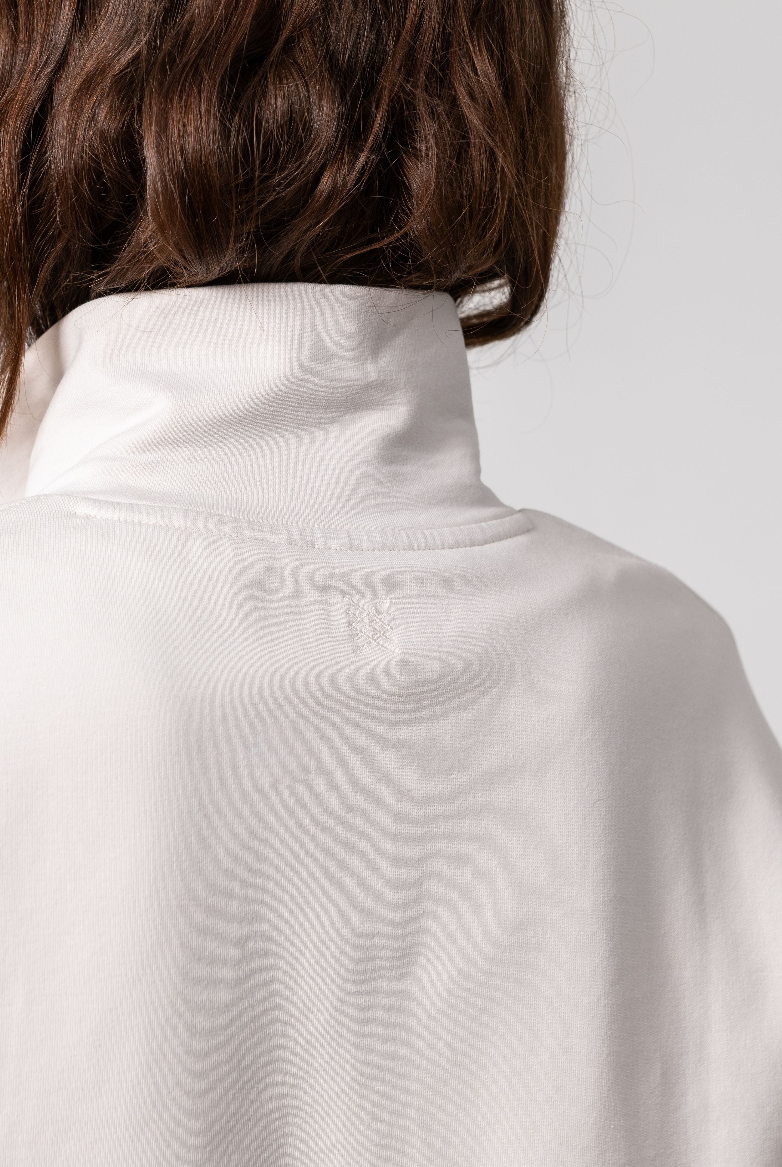 Women shown wearing a Beige Quarter zip pullover